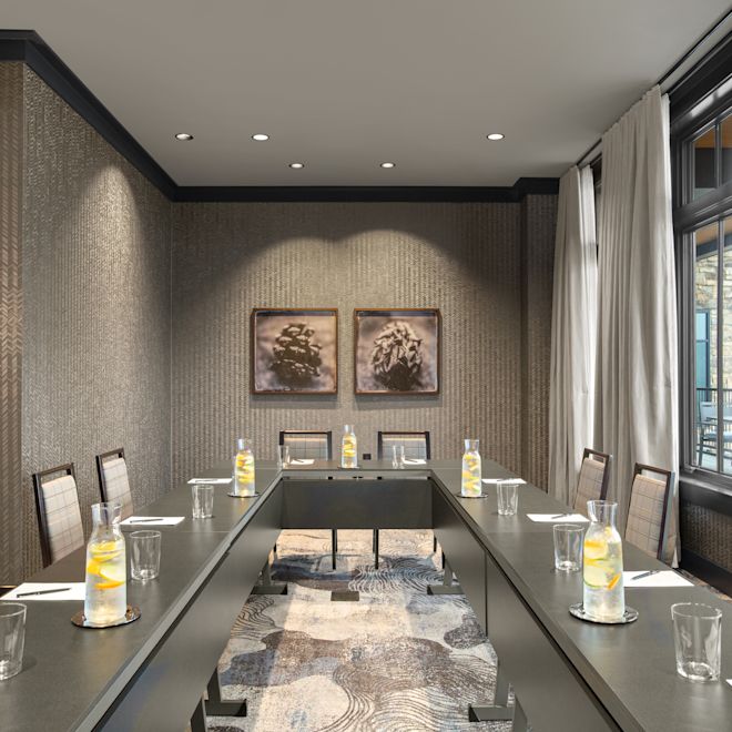 Azalea meeting room set up in a long u-shape style.