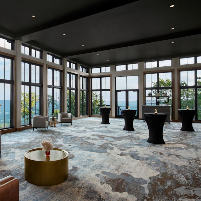 Skyline Ballroom foyer, and pre-function area with a panoramic view overlooking the ocean through floor-to-ceiling windows.