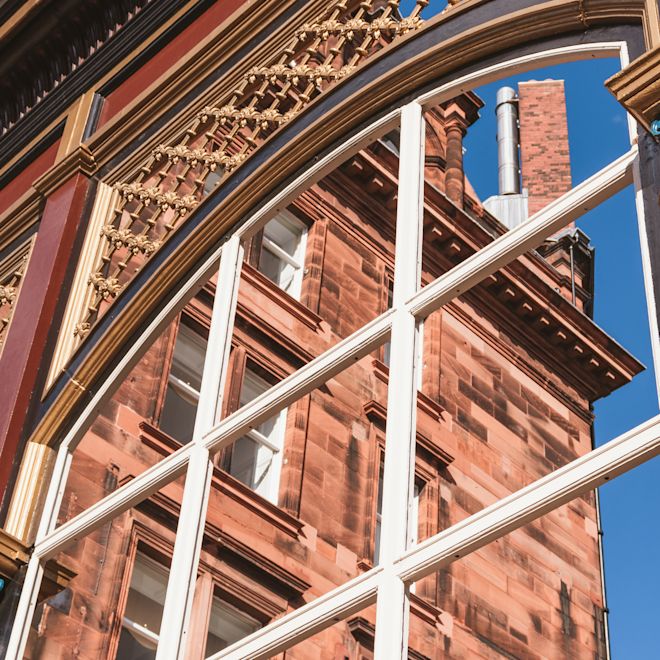 Shot of building in reflection of window