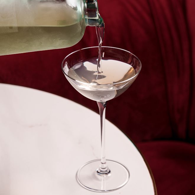 a Coastal Martini Pouring on a Glass at the Court