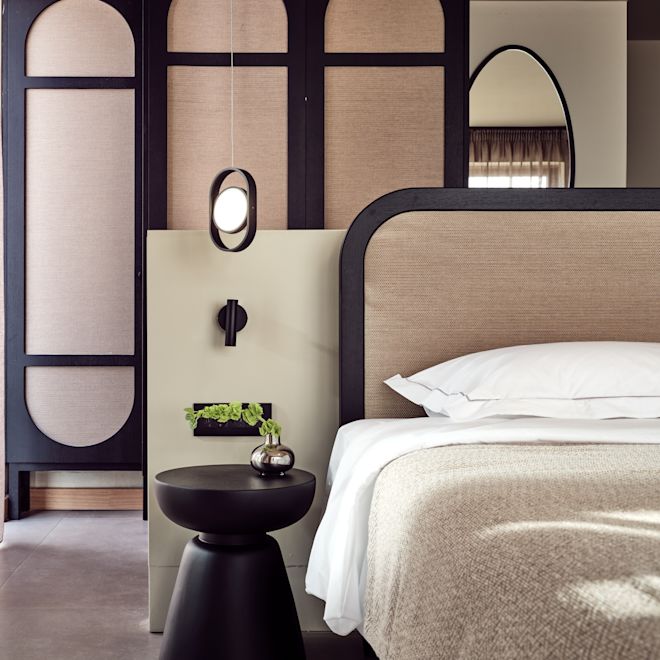 Bed and Nightstand in a Guest Room
