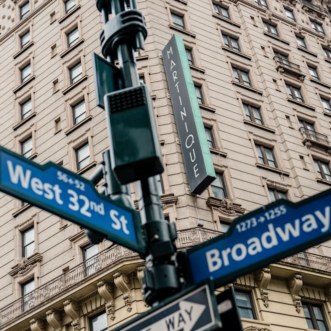 hotel exterior and street signs