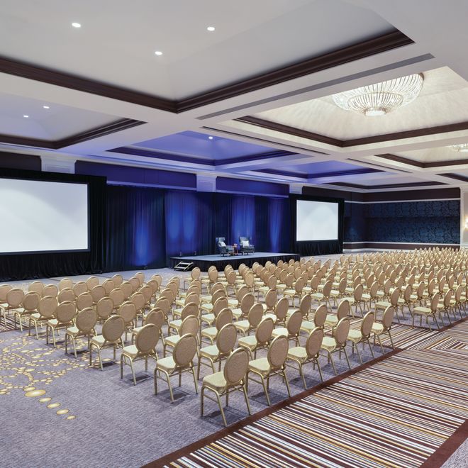 large ballroom with rows of chairs
