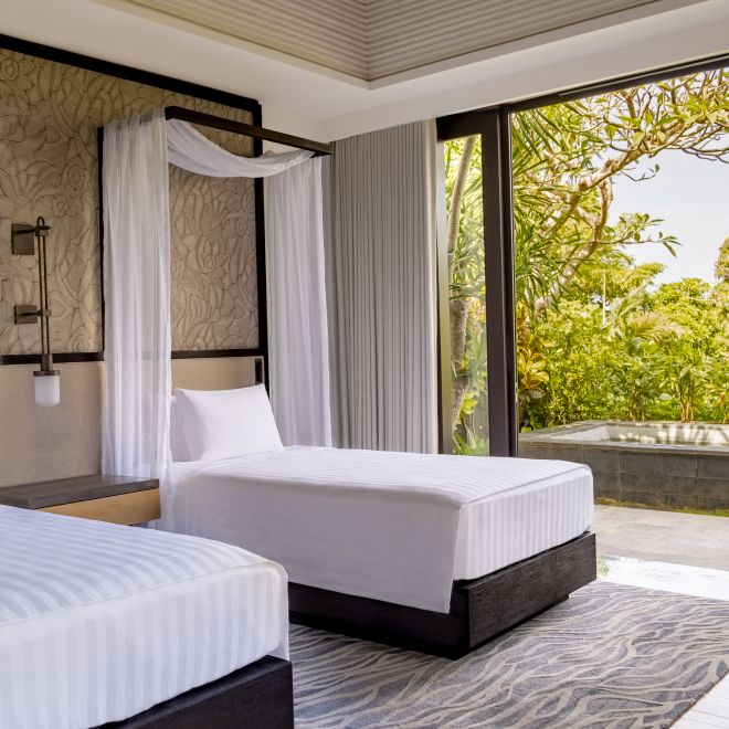 Guestroom with beds and view from large window