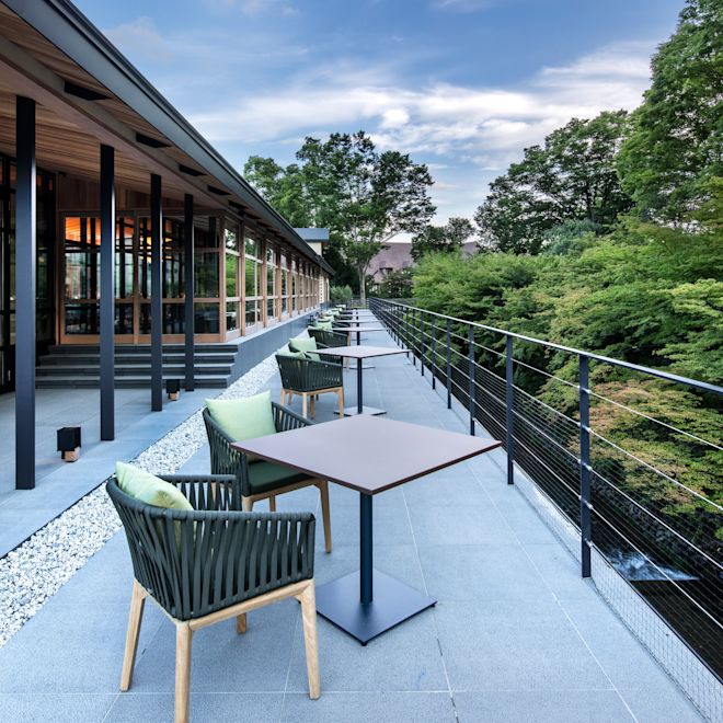 Outdoor terrace with tables and chairs