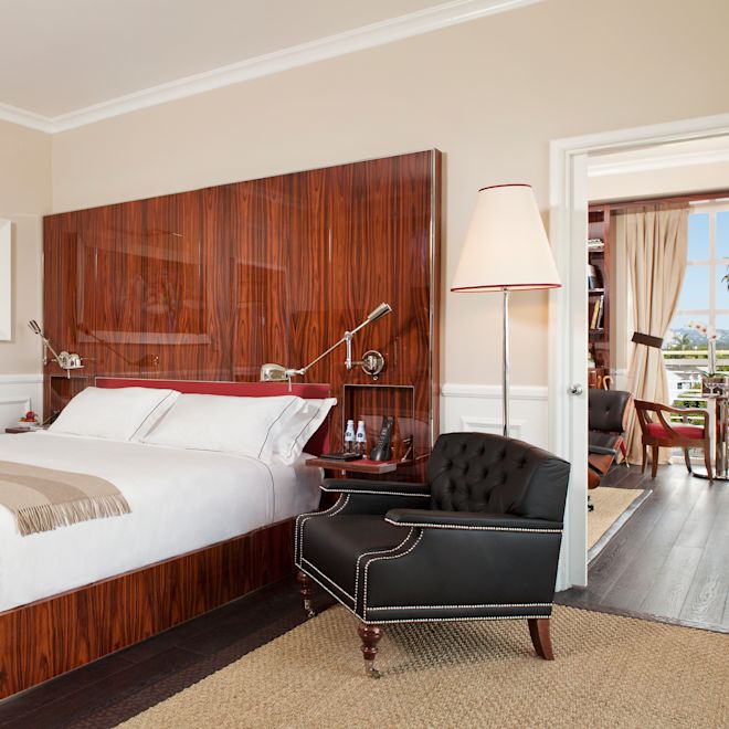 Bed in room with chair