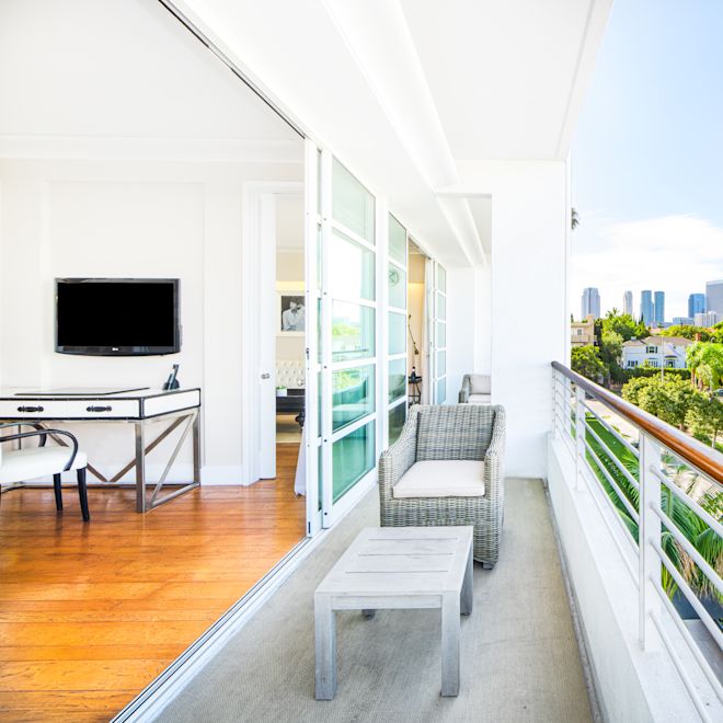 Balcony area with table and chair
