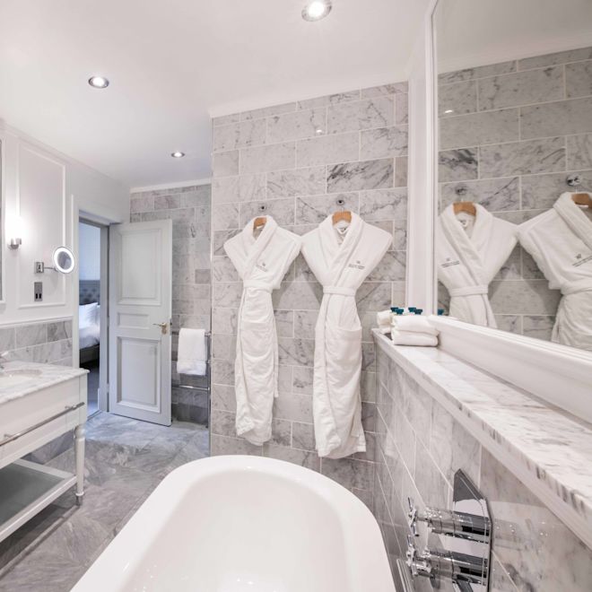 A bathroom with a tub and sink