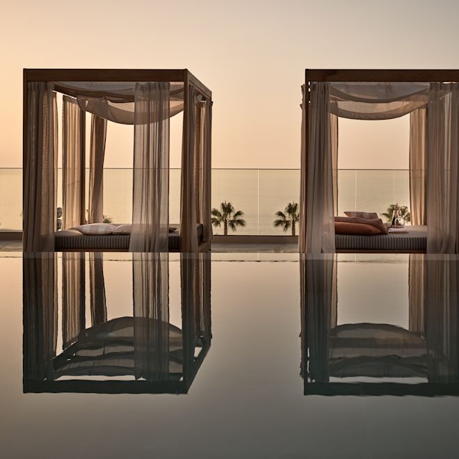 Outdoor Pool Area with Cabanas