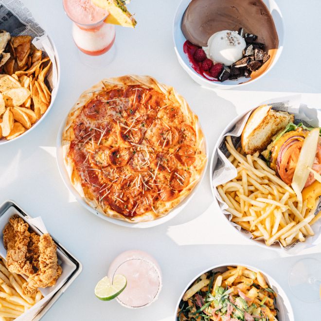 Overhead view of food with pizza