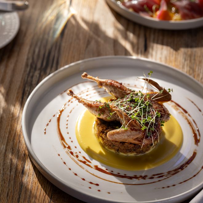 Poultry Dish on a Plate at Signature Restaurant