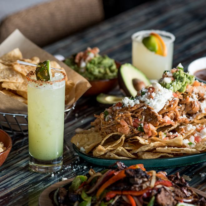 Nachos, Rice, Meat and Margaritas on a Table at Primero Cantina