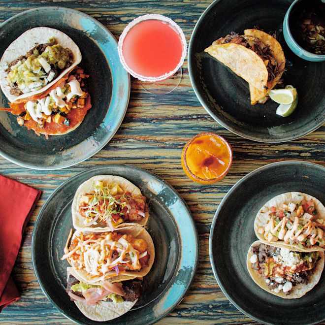 Plates with Selection of Tacos on a Table at Primero Cantina
