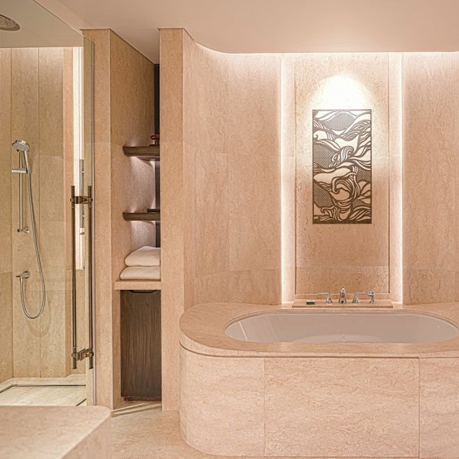 Separate Soaking Tub and Shower in King Corner Suite Bathroom