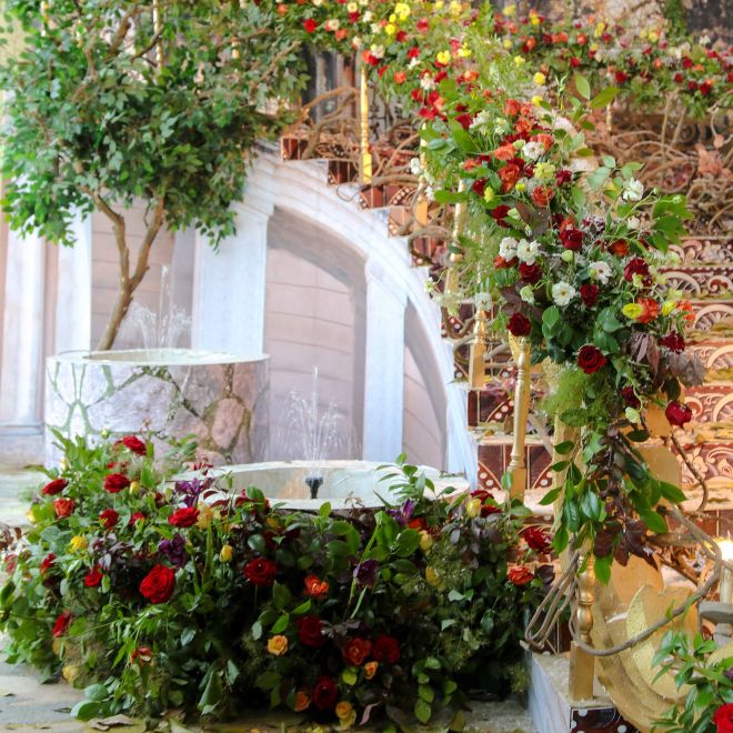 an area decorated with flowers for a wedding