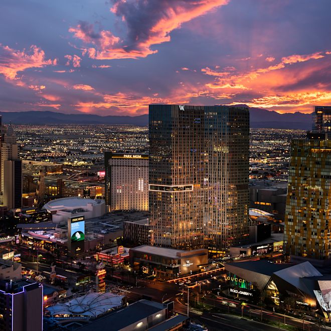 aerial view of hotel exterior at dusk