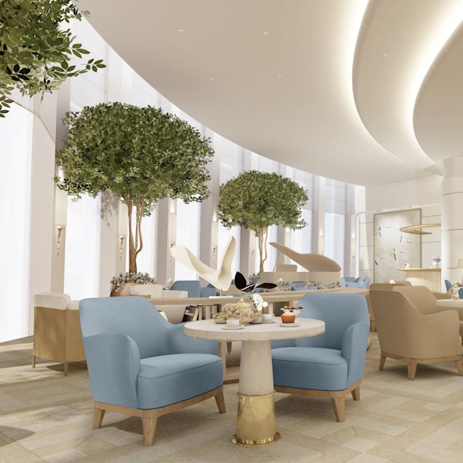 Accès au salon de l'hôtel avec fauteuils et baies vitrées