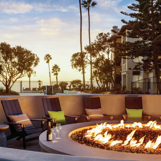 Patio Area with Seat Around a Fire Pit