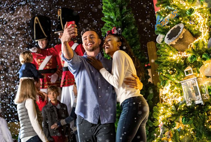 guests taking a photo at disney land