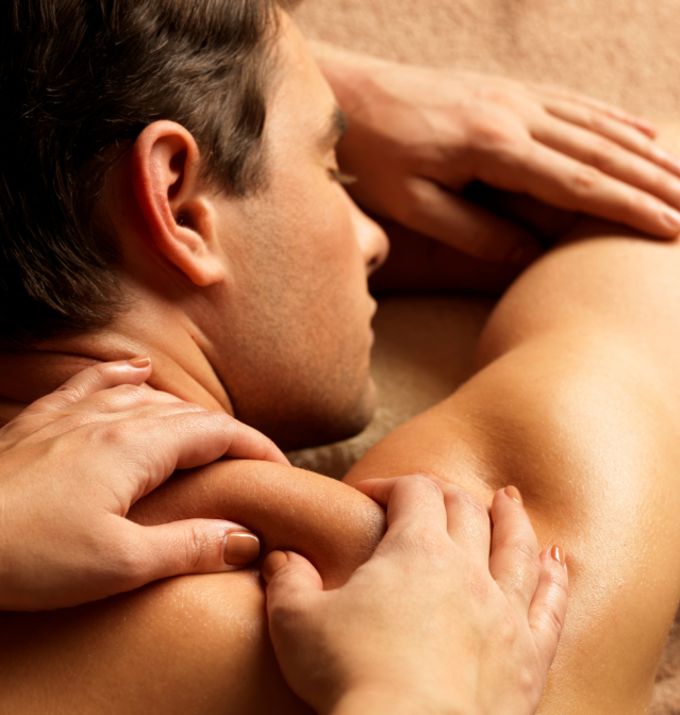 man receiving shoulder massage
