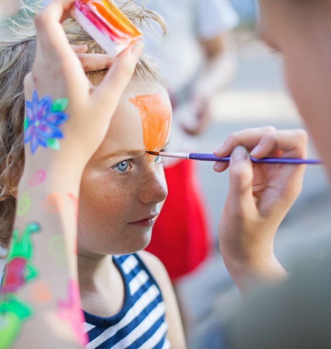 Kids getting face painted