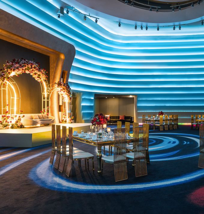 Wedding event room with waved wall lights