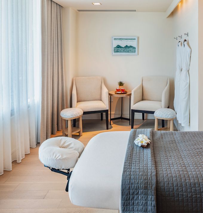 Massage Bed and Seating Area at Spa Ka La'i