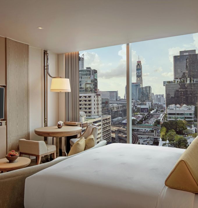 King Bed, Flat Screen TV, and City View in Deluxe Guest Room