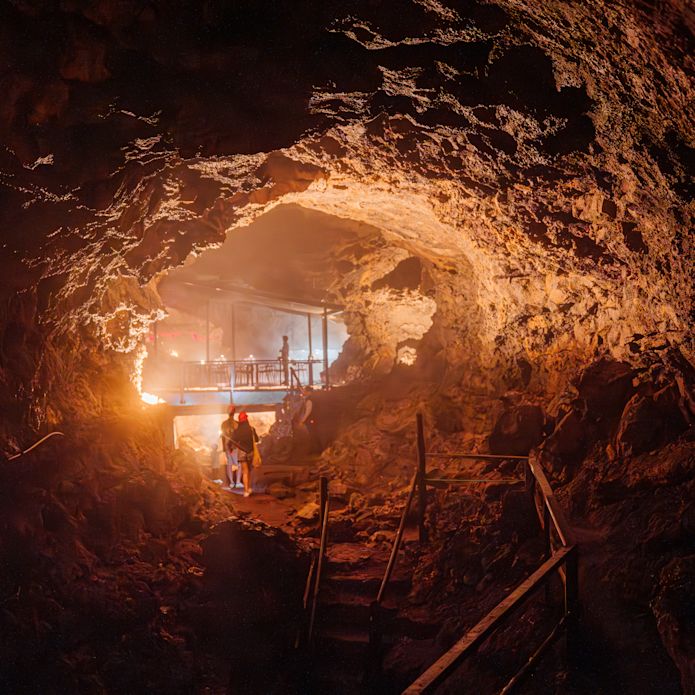 People Walking Around Lava Tunnel Restaurant