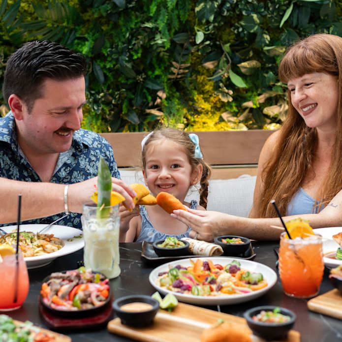 Family Dining on a Terrace of Allison Restaurant and Bar