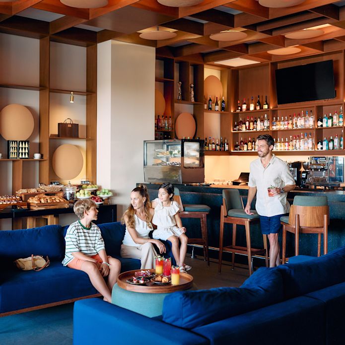 Family hanging out at the Enclave Lounge.