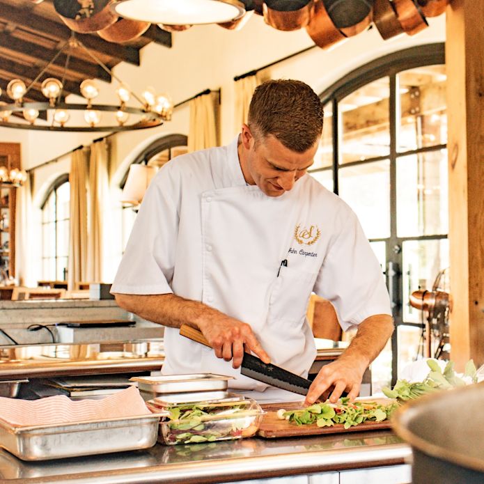 Chef John Preparing Food at Signature Restaurant