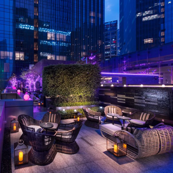 Rooftop Bar seating area with views of city