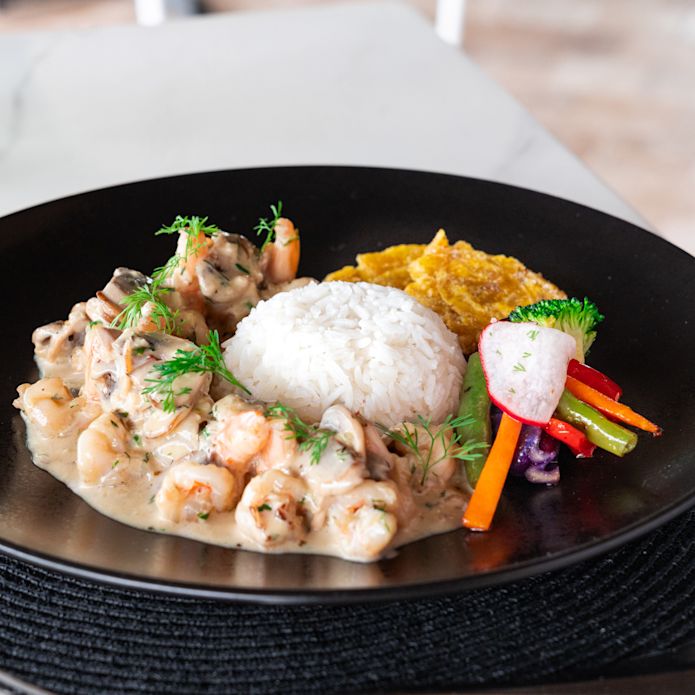 Shrimp Dish på en tallrik på hotellets restaurang