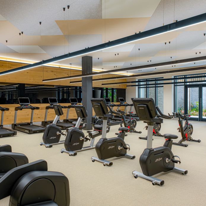 Fitness Center with Treadmills Recumbent Bikes and Other Equipment