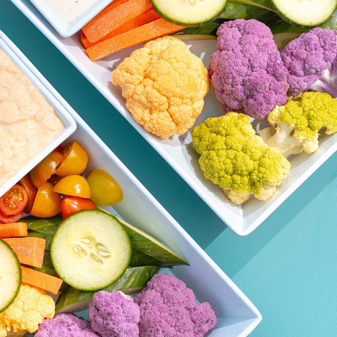 vegetable snack plates with cauliflower, cucumber, carrots, hummus, ranch dip, from Jade waters grill
