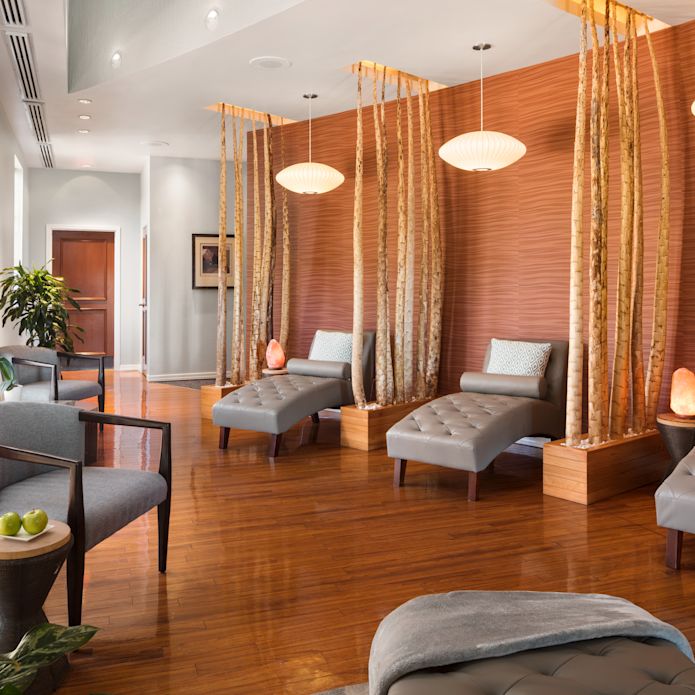 Spa Treatment Area with Spa Massage Beds and Armchairs