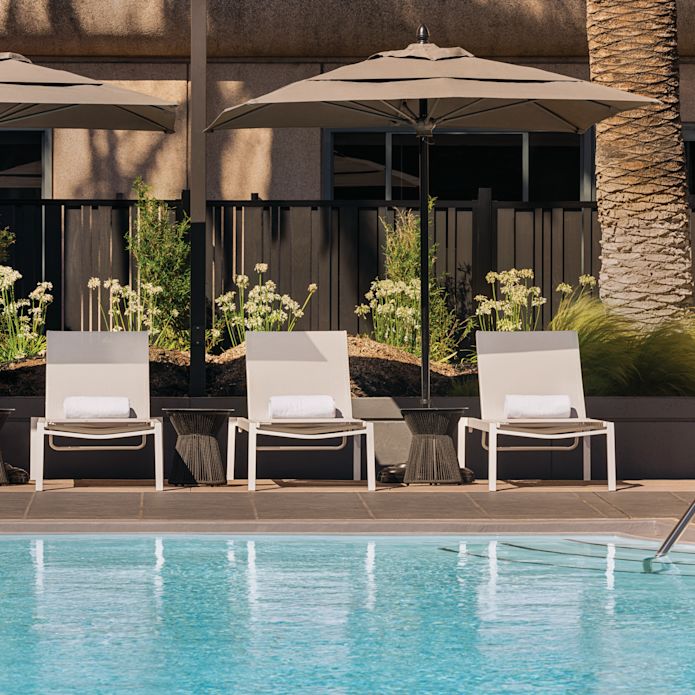 outdoor pool and lounge chairs