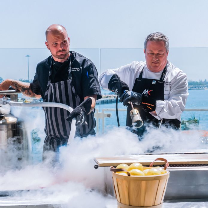 outside event, chefs with dry ice machine