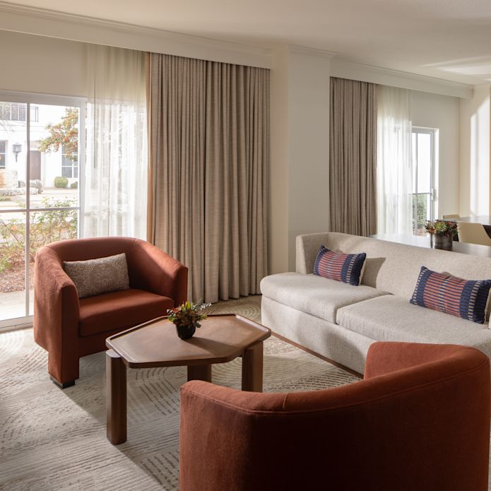 Hospitality suite with sofa and chairs