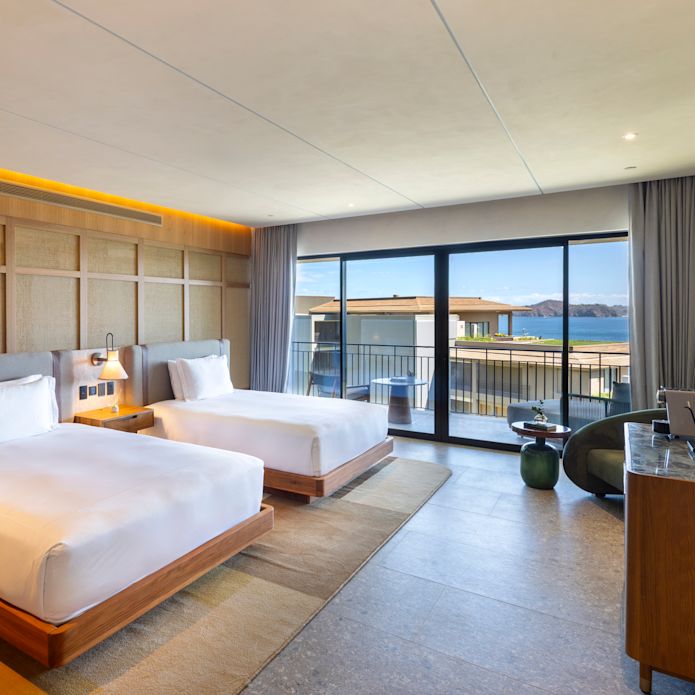 Two Beds in a Suite with Balcony