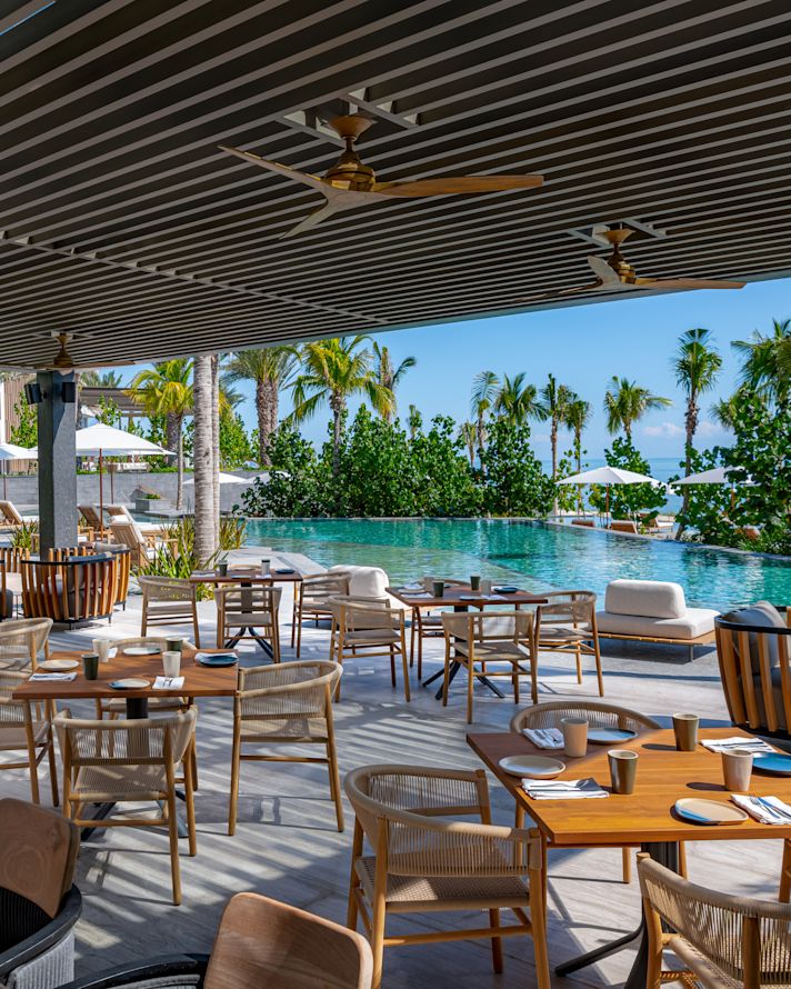 outdoor dining seating by pool
