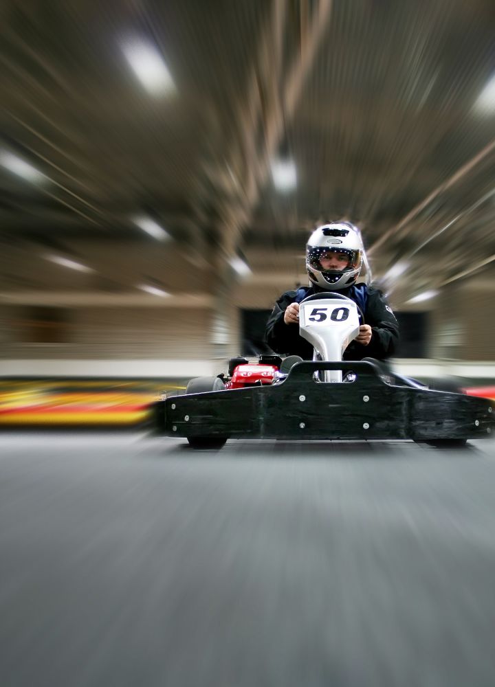 Andretti go cart track, boy driving a go cart