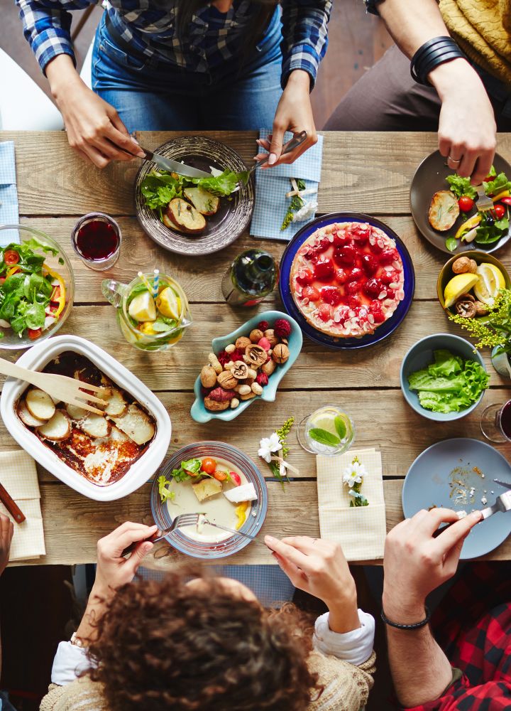 family at the dining table, dinner entrees and drinks