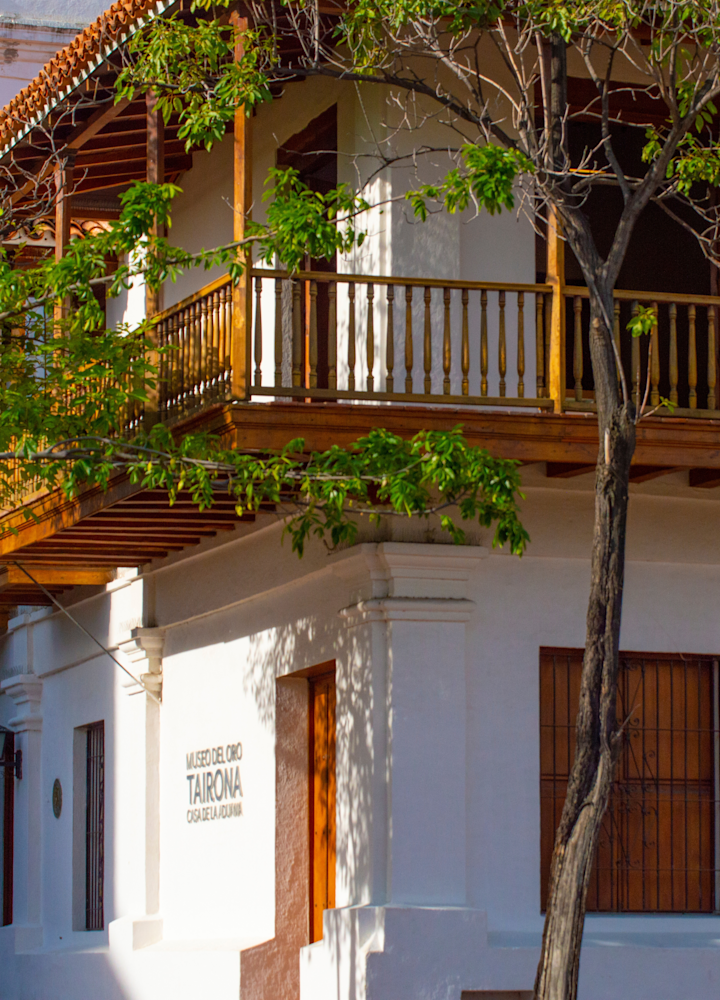 Shot of building in day with wooden balconies