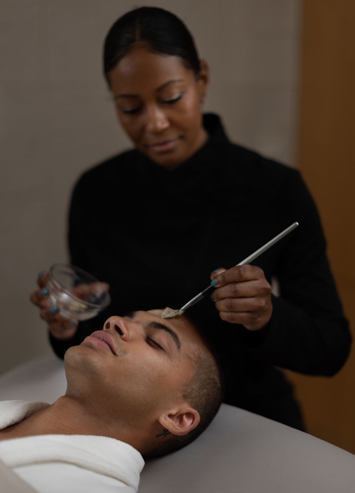 Man Getting a Facial at the Spa