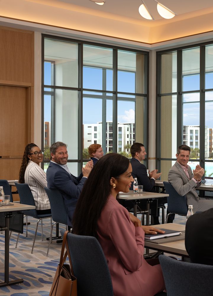 Business Travelers in the Juniper Meeting Room with Classroom Breakout Setup