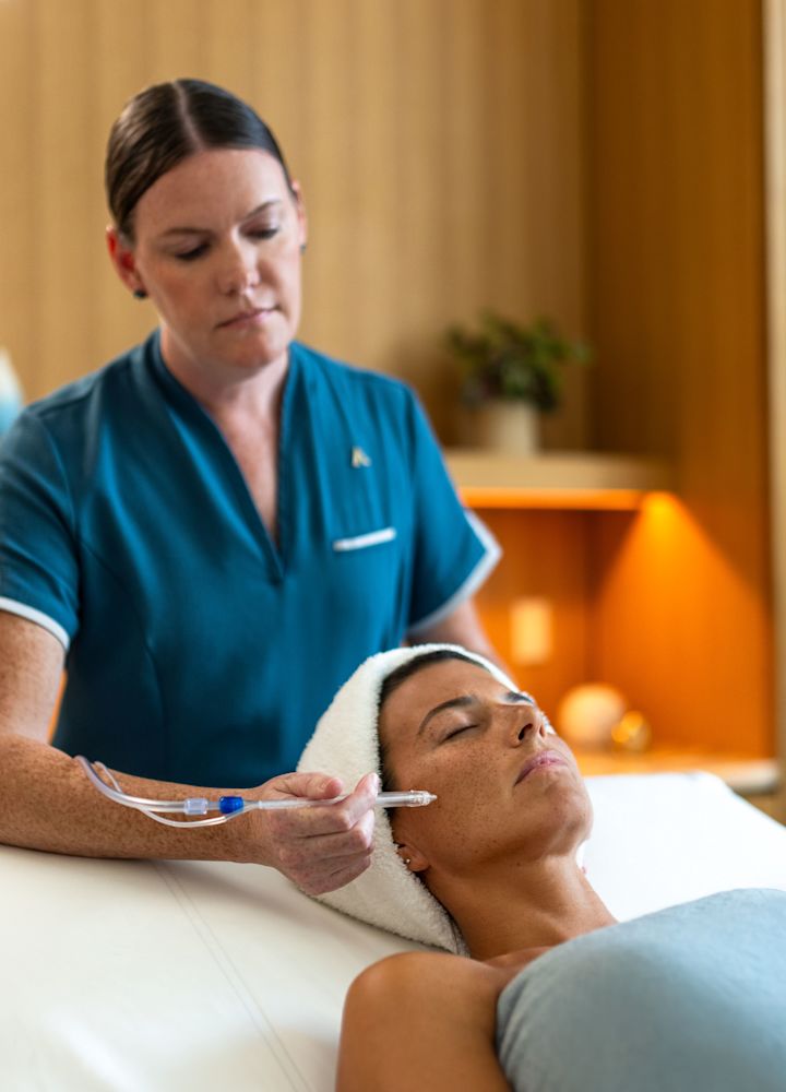guest receiving a facial in the spa