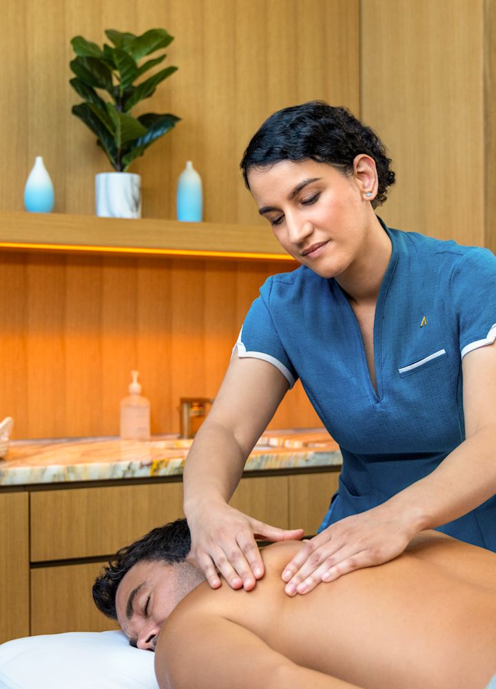 guest receiving a massage at the spa