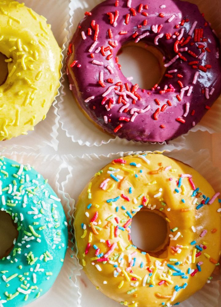 Top down view of colourful donuts